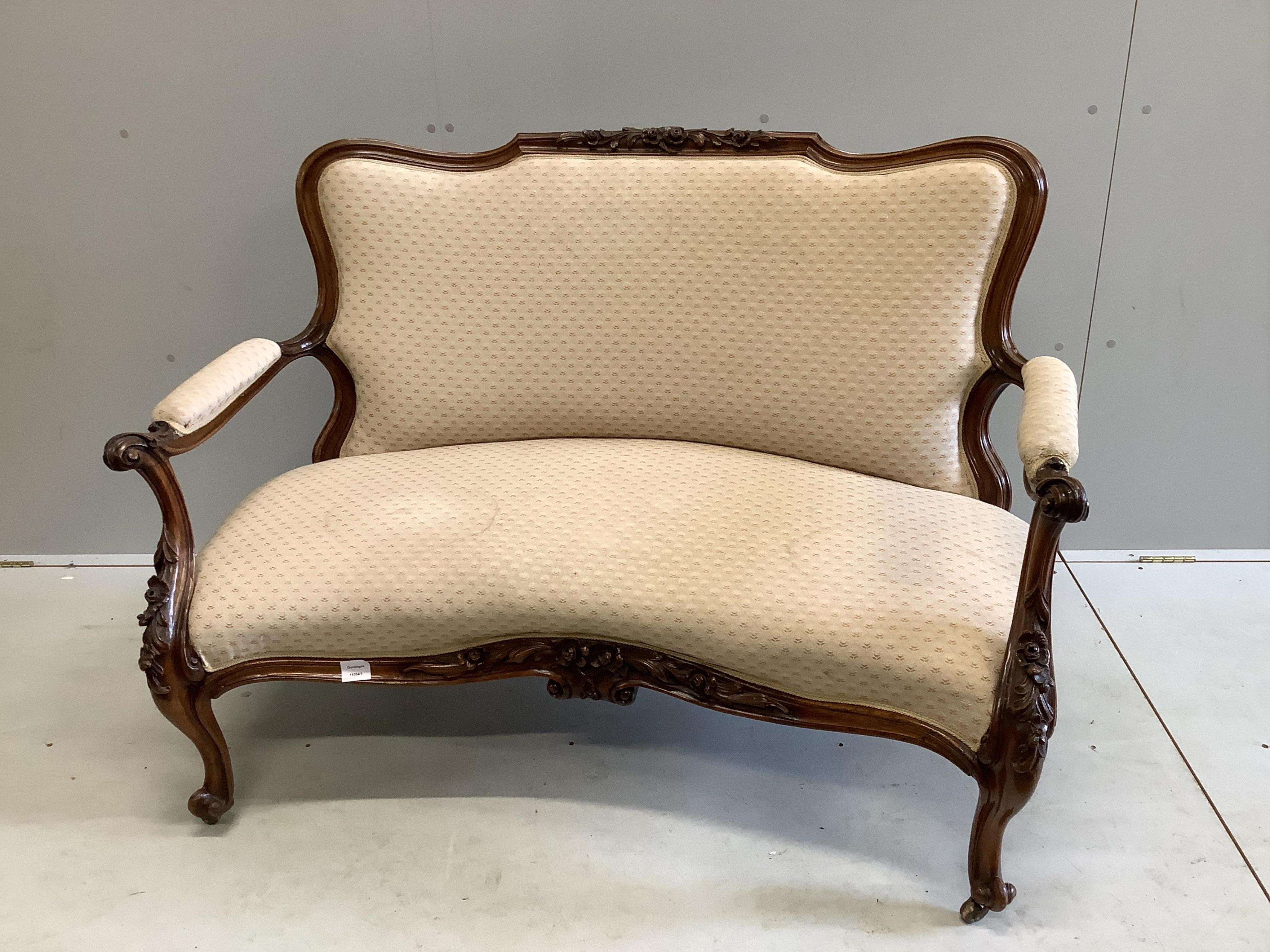 A Victorian rosewood two seater settee, width 130cm, depth 70cm, height 90cm. Condition - fair